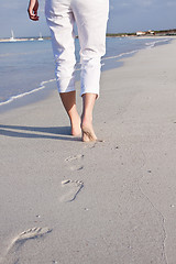 Image showing barefoot in the sand in summer holidays