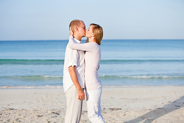 Image showing happy couple in love having fun on the beach