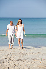 Image showing happy couple in love having fun on the beach