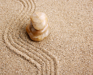 Image showing Zen stone in the sand 