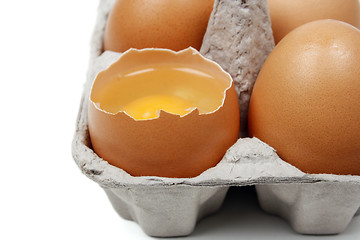 Image showing Broken egg in eggbox