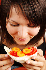 Image showing Beautiful woman eating  