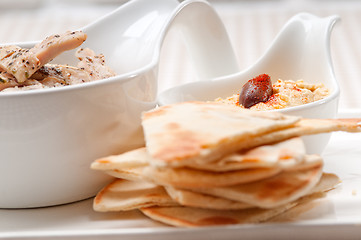 Image showing chicken taboulii couscous with hummus