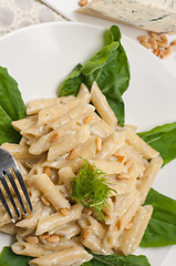 Image showing Italian pasta penne gorgonzola and pine nuts