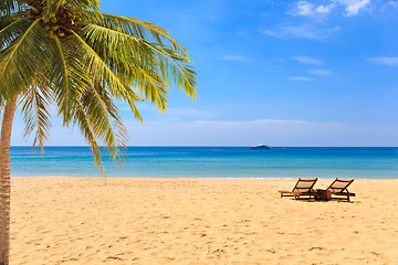 Image showing beds and umbrella on a beach