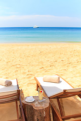 Image showing beds and umbrella on a beach