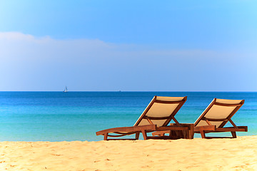 Image showing beds and umbrella on a beach