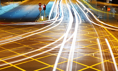 Image showing car with blur light through city at night