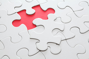 Image showing puzzle with missing red piece