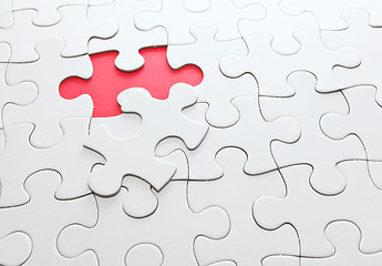 Image showing puzzle with missing red piece