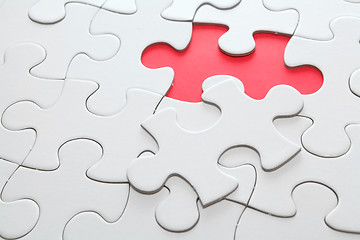 Image showing puzzle with missing red piece