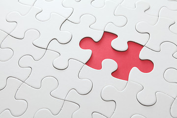 Image showing puzzle with missing red piece 