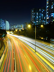 Image showing light trails on highway 