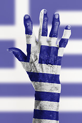 Image showing Old hand with flag, European Union, Greece