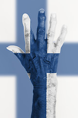 Image showing Old hand with flag, European Union, Finland