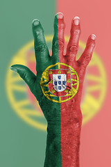 Image showing Old hand with flag, European Union, Portugal