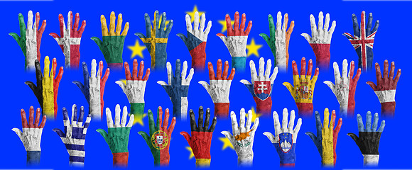 Image showing Hands with flag painting of the EU-coutries