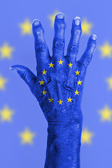 Image showing Old hand with flag, European Union, EU