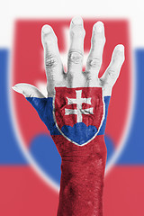 Image showing Old hand with flag, European Union, Slovakia