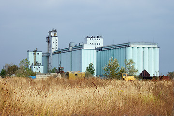 Image showing Grain elevator rises among the steppe