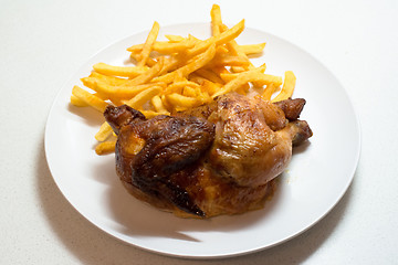 Image showing Chicken roasted with fries