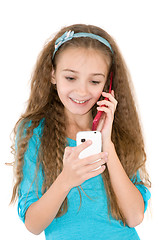 Image showing The girl with mobile phone