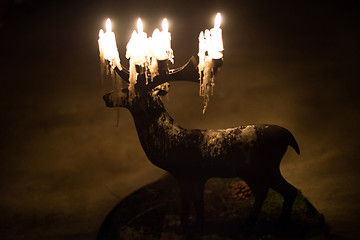 Image showing Candles and deer decoration