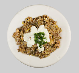 Image showing Buckwheat porridge with sour cream and dill