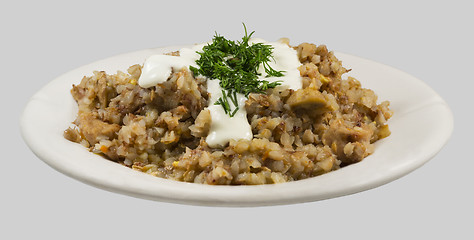 Image showing Buckwheat porridge with sour cream and dill