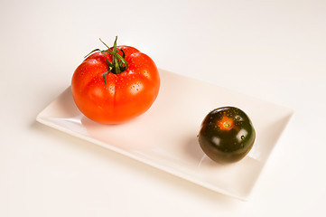 Image showing Red and green tomatoes