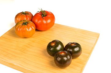 Image showing Red and green tomatoes