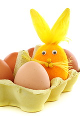 Image showing Easter bunny with eggs in the box.