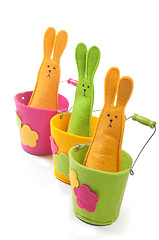 Image showing Multicolored easter bunnies (vertical view)