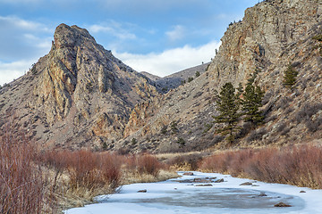 Image showing frozen stream and landmark rock