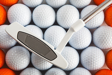 Image showing Golf putter and balls