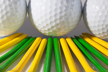 Image showing Golf balls and tees