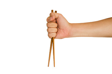 Image showing hand holding chopstick