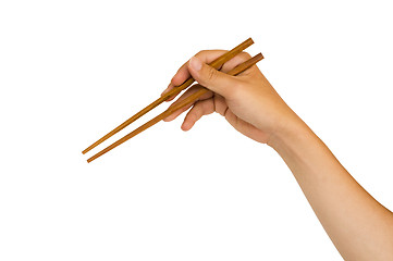 Image showing hand holding chopstick