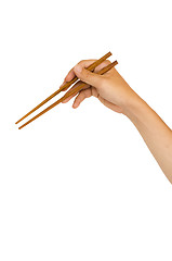 Image showing hand holding chopstick