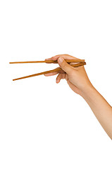 Image showing hand holding chopstick