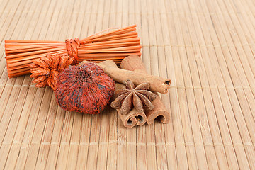 Image showing Star Anise and cinnamon on wooden background 
