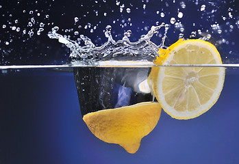 Image showing Lemon thrown into the water, motion, background