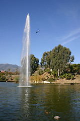 Image showing water fountain in a lake