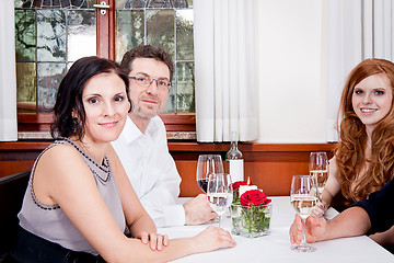 Image showing smiling happy people in restaurant