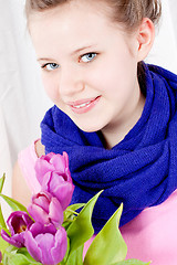 Image showing smiling teenager girl with pink tulips bouquet 