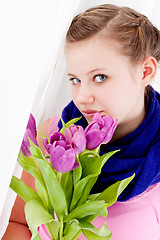 Image showing smiling teenager girl with pink tulips bouquet 