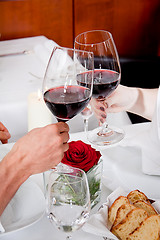 Image showing couple drinking red wine in restaurant