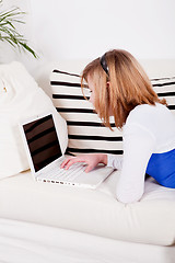 Image showing young teenager girl with laptop smilig