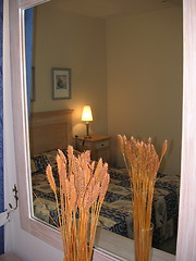 Image showing bedroom interior reflection