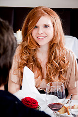 Image showing couple drinking red wine in restaurant